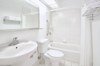 In-room safe, desk, iron/ironing board, cribs/infant beds at Ilima Hotel