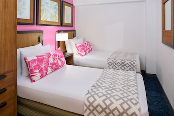 Suite, 2 Bedrooms, Kitchen | In-room safe, desk, iron/ironing board, cribs/infant beds at Ilima Hotel