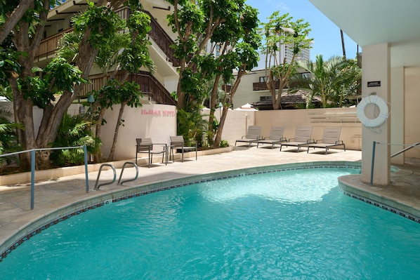 Outdoor pool, open 8:00 AM to 10:00 PM, sun loungers