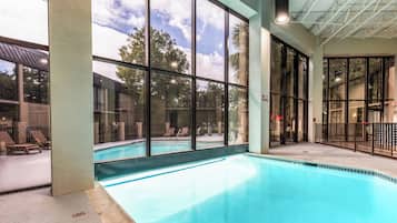 Indoor pool, outdoor pool, pool umbrellas, sun loungers