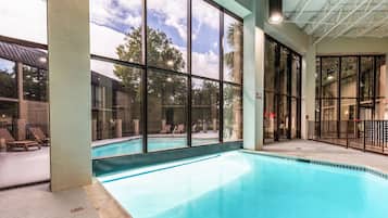 Indoor pool, outdoor pool, pool umbrellas, pool loungers