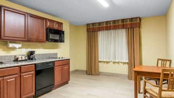 Desk, laptop workspace, blackout curtains, iron/ironing board