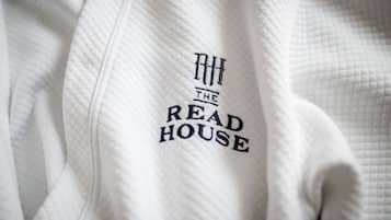 A white garment with the text "RH THE READ HOUSE" embroidered on it.
