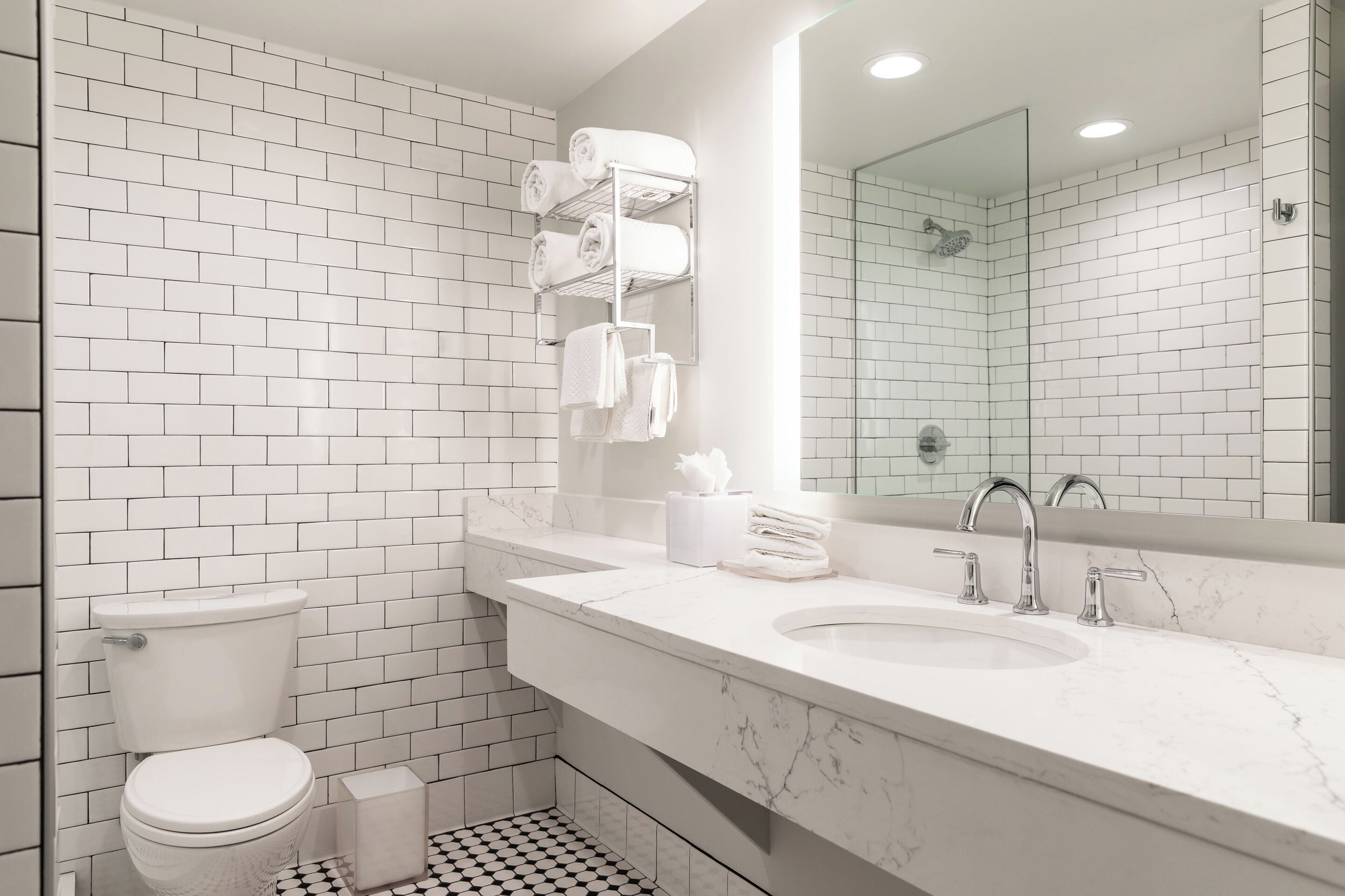 eco-friendly toiletries, hair dryer, towels