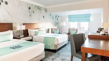 Habitación Deluxe, 2 camas matrimoniales | 1 habitación y ropa de cama de alta calidad