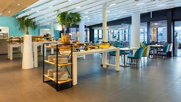 Daily buffet breakfast (EUR 23 per person)