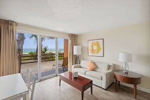 Suite, Ocean View | Living area | TV