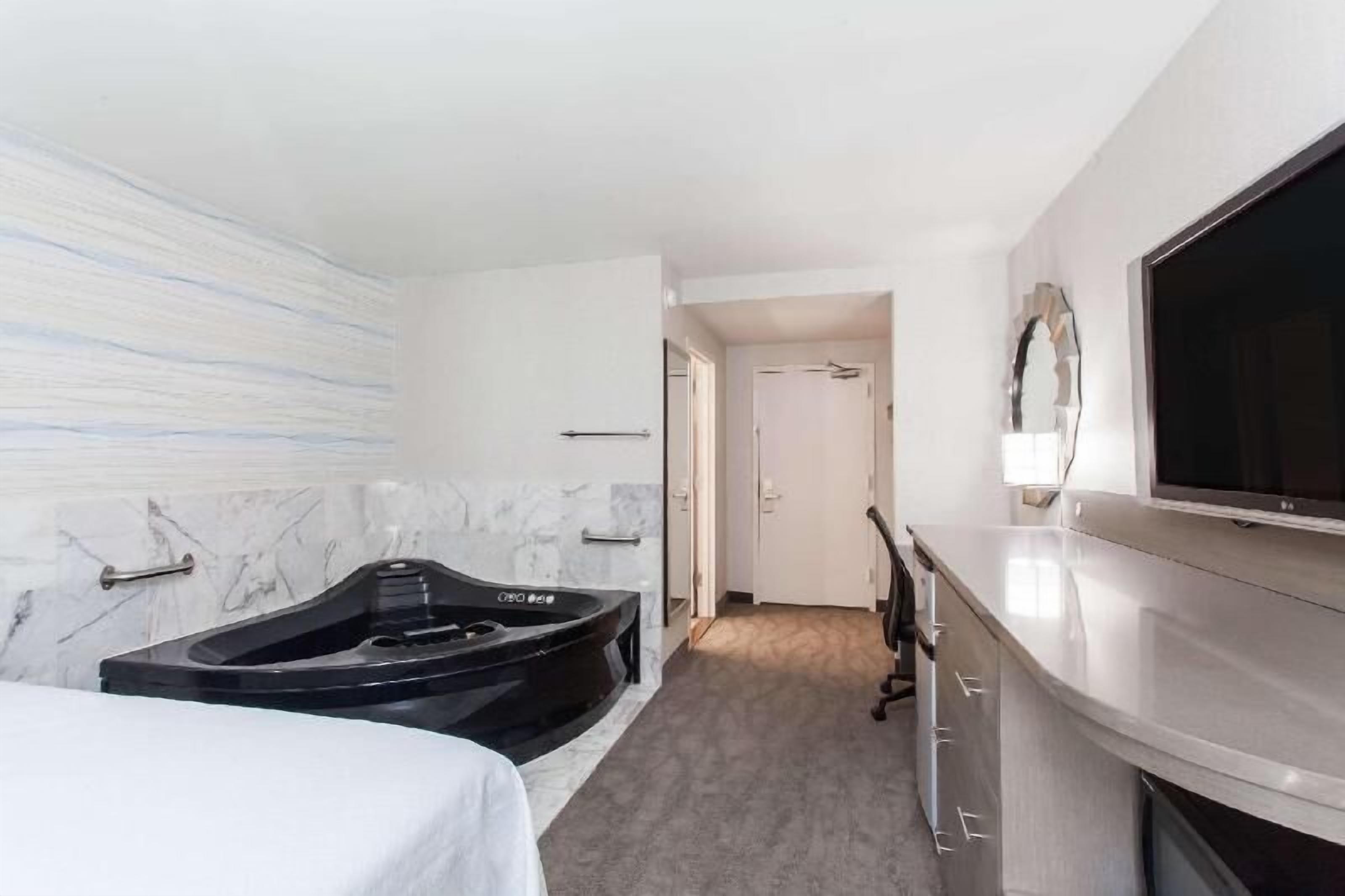 In-room safe, desk, iron/ironing board, free cribs/infant beds