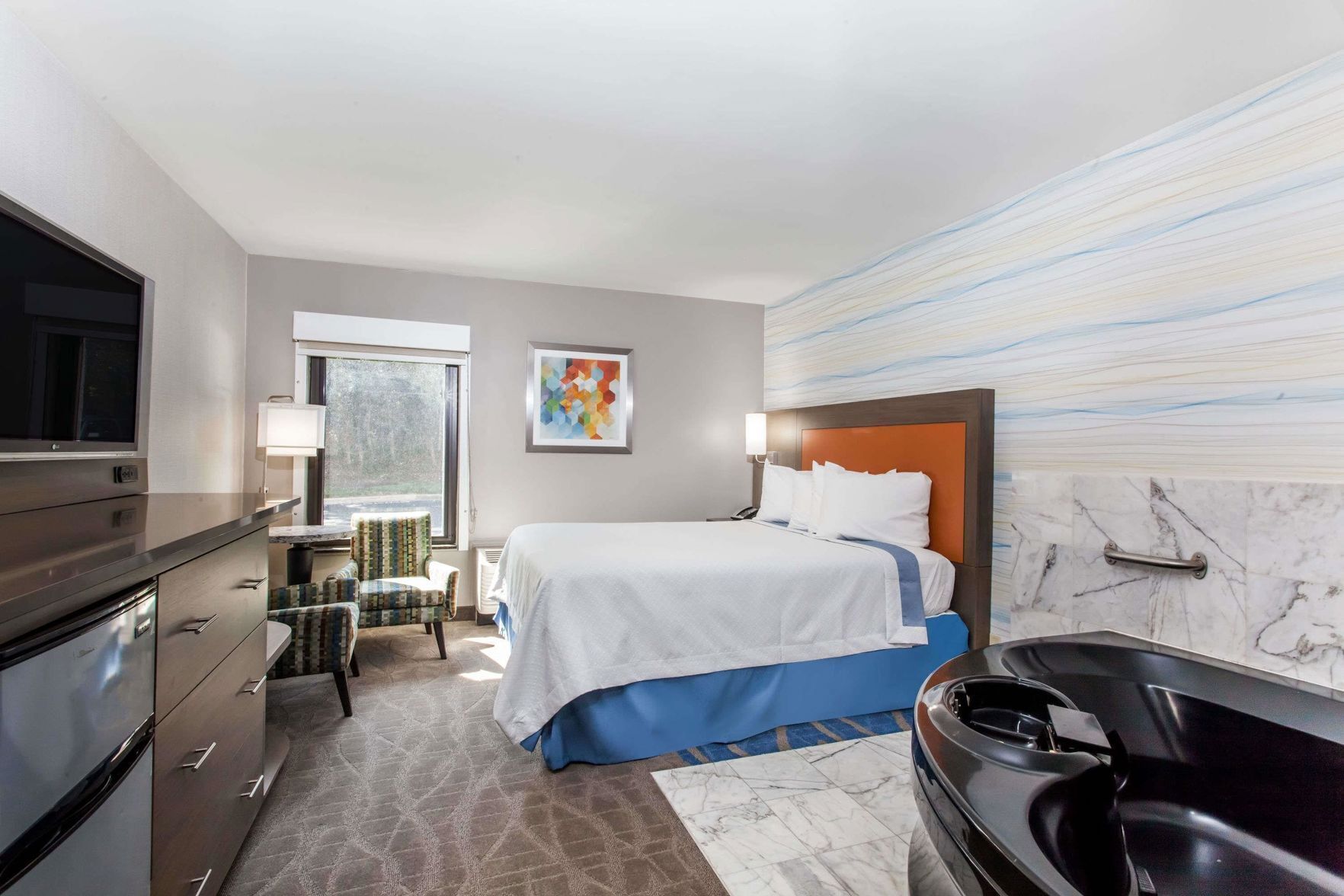 In-room safe, desk, iron/ironing board, free cribs/infant beds