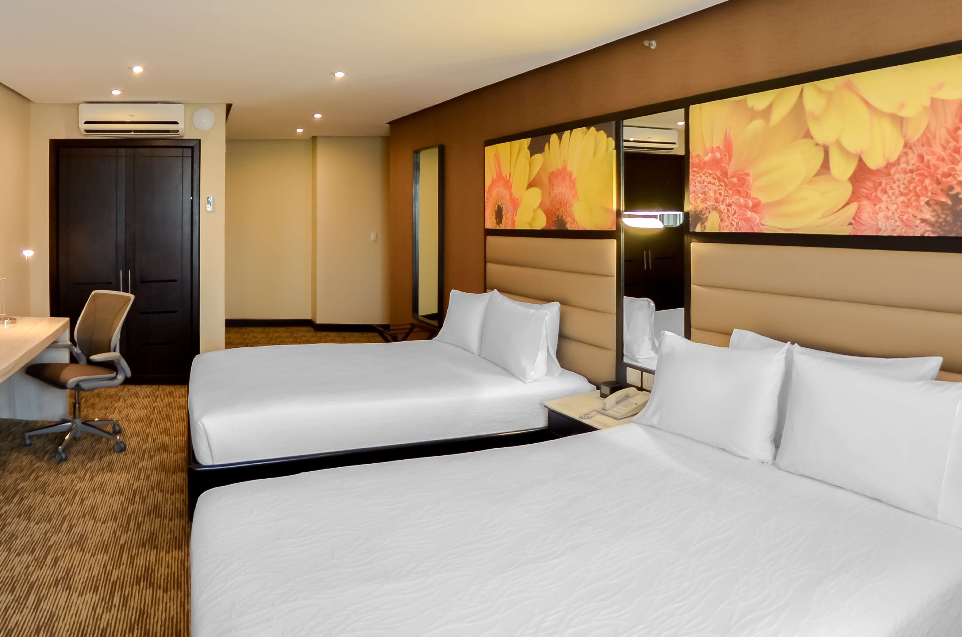 room, 2 queen beds, city view | 1 bedroom, in-room safe, desk, soundproofing