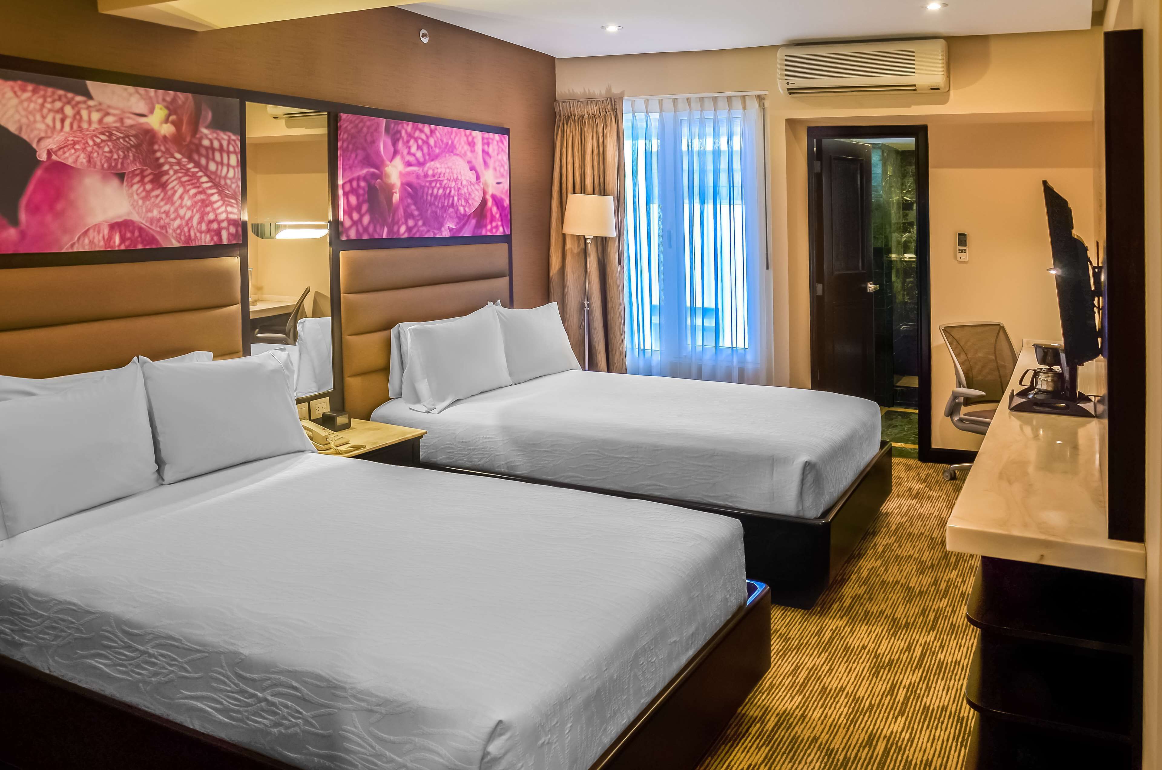 room, 2 double beds | 1 bedroom, in-room safe, desk, soundproofing