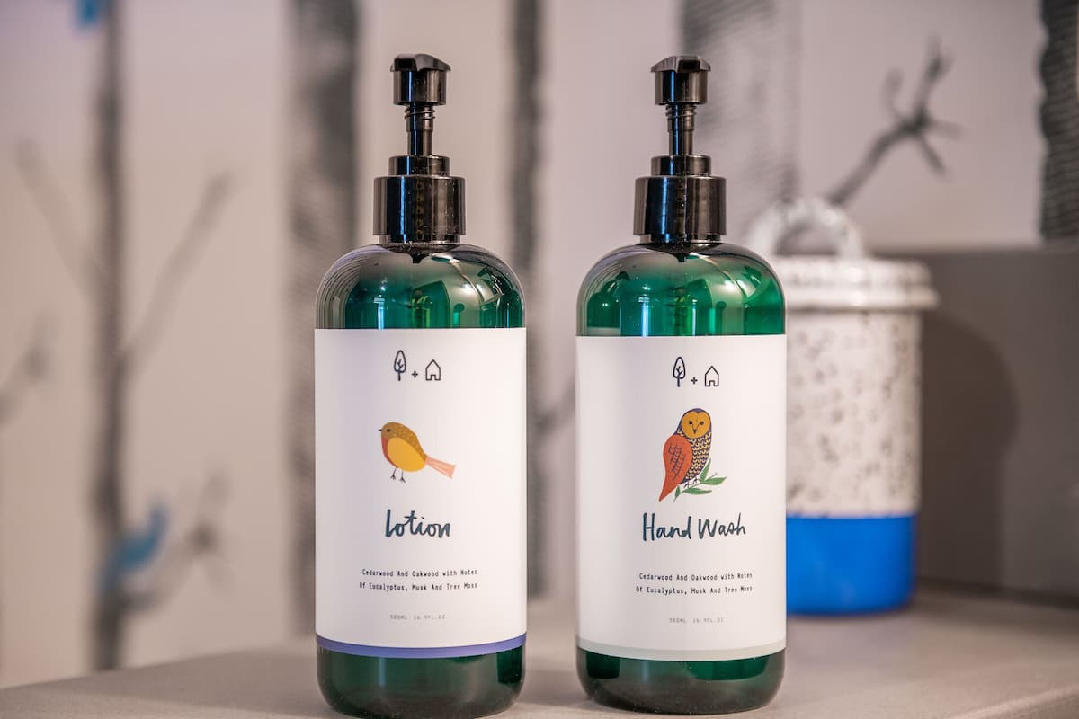 Designer toiletries, hair dryer, bathrobes, towels