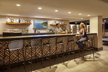 Rooftop bar, pool views, open daily at Hilton Garden Inn Waikiki Beach
