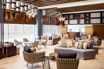 Hotel entrance and lobby at Hilton Garden Inn Waikiki Beach