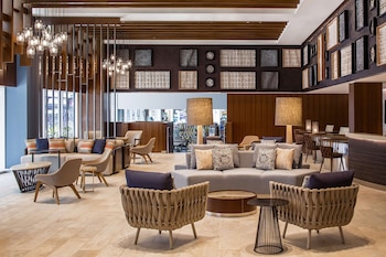 Hotel entrance and lobby at Hilton Garden Inn Waikiki Beach
