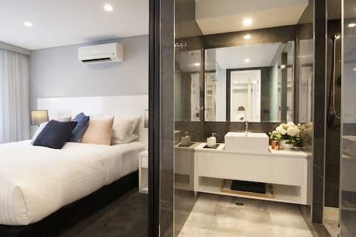 Crown Suite | Premium bedding, pillow-top beds, desk, laptop workspace