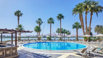 2 outdoor pools, pool umbrellas, pool loungers