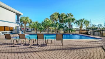 Outdoor pool, open 9:00 AM to 8:00 PM, pool umbrellas, pool loungers