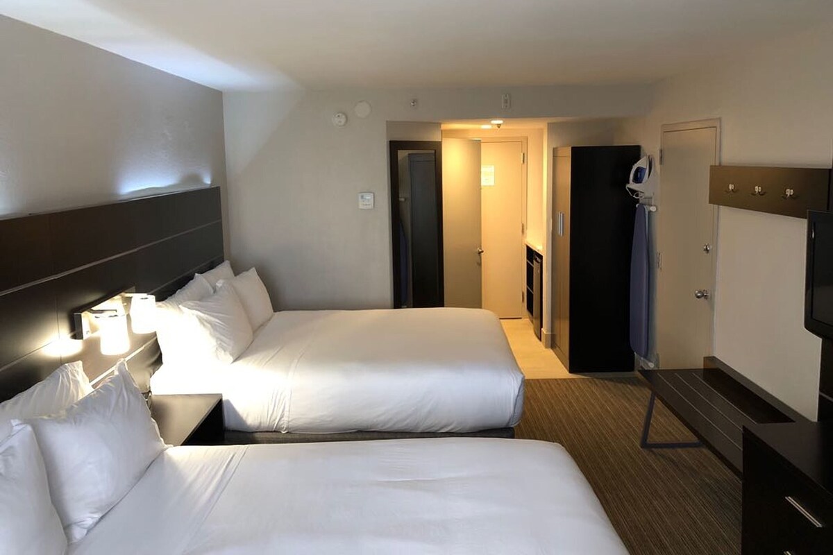 Standard Room, 2 Queen Beds | In-room safe, desk, blackout drapes, iron/ironing board