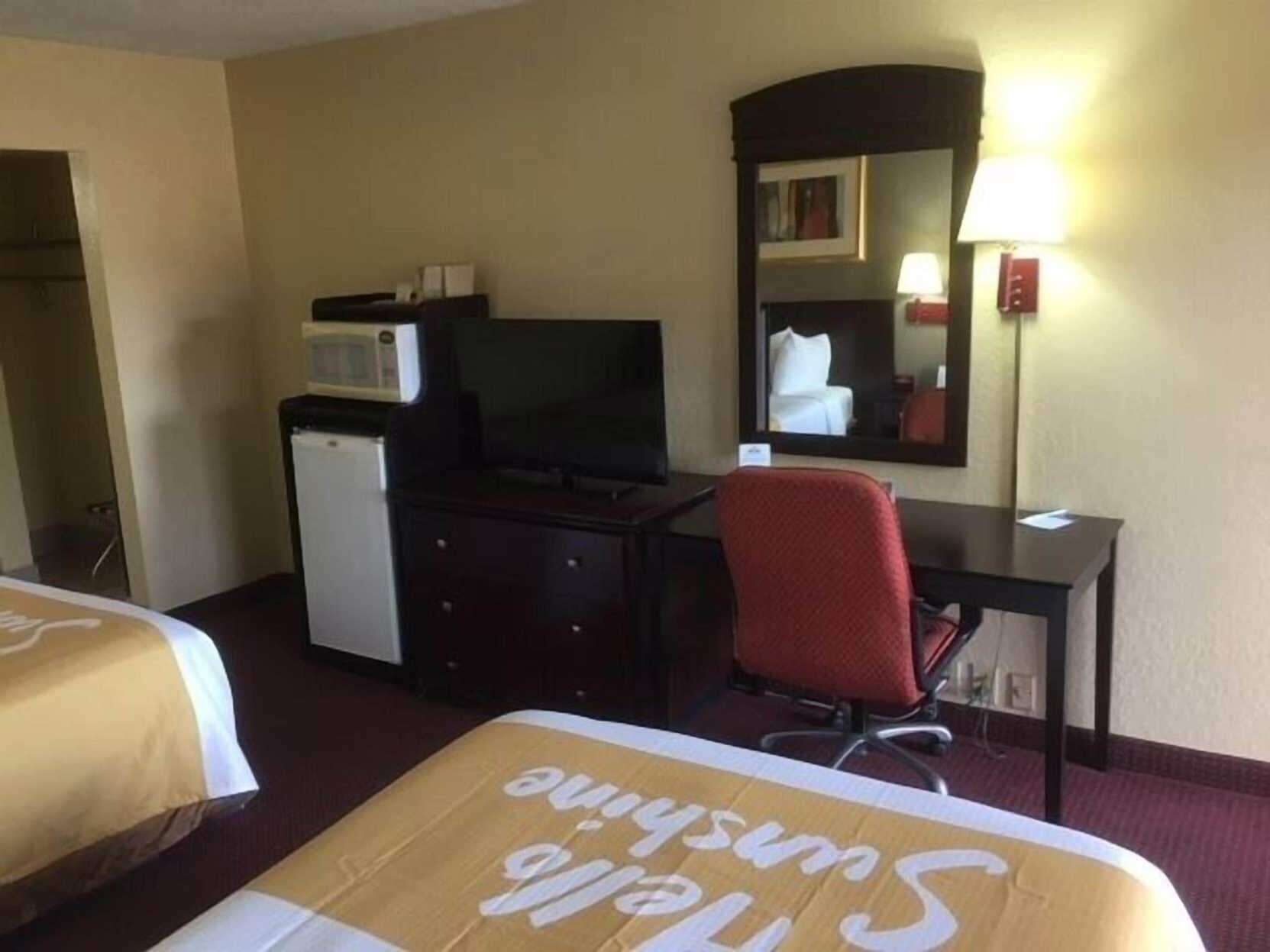 Desk, iron/ironing board, cribs/infant beds, rollaway beds