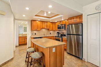 Deluxe Room, 1 King Bed, Partial Ocean View | Private kitchenette | Fridge, coffee/tea maker at Aston at the Maui Banyan