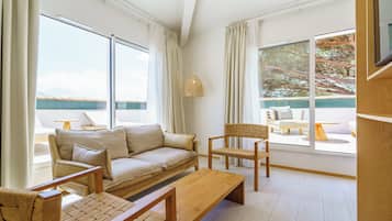 Suite, Terrace, Pool View | Living area | TV