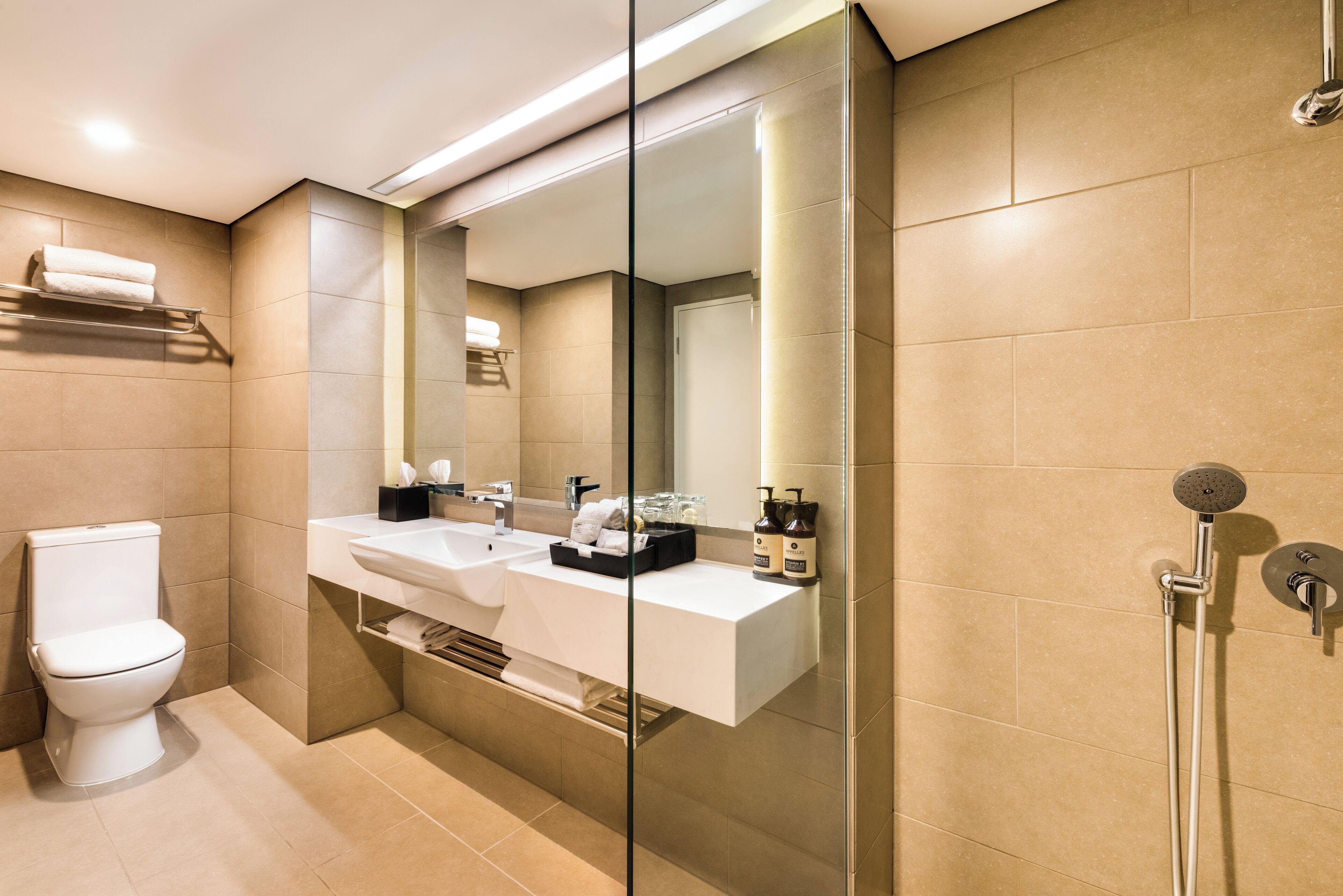 executive suite | bathroom | shower, free toiletries, hair dryer, bathrobes