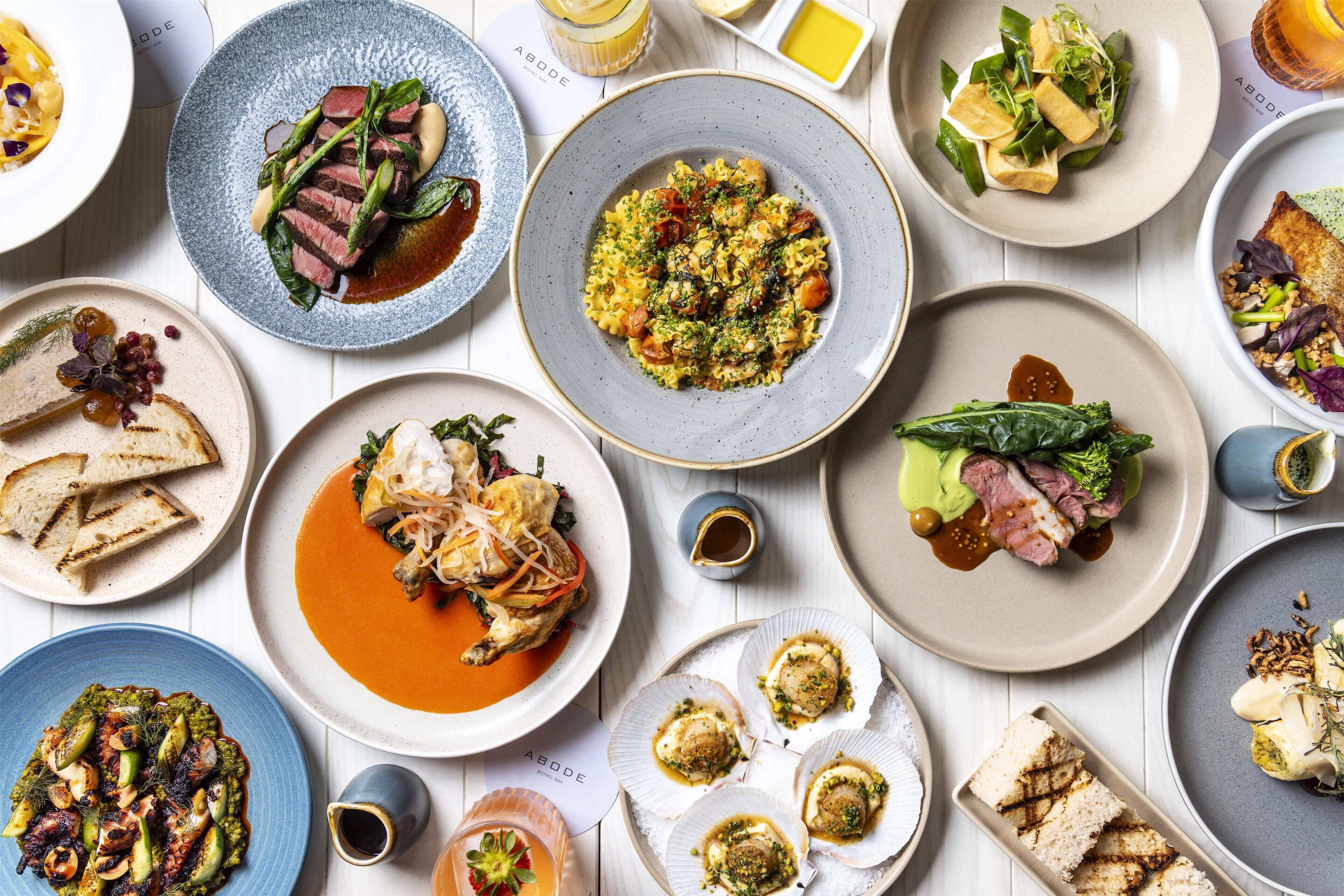 A variety of dishes on a table, suggesting a dining experience.