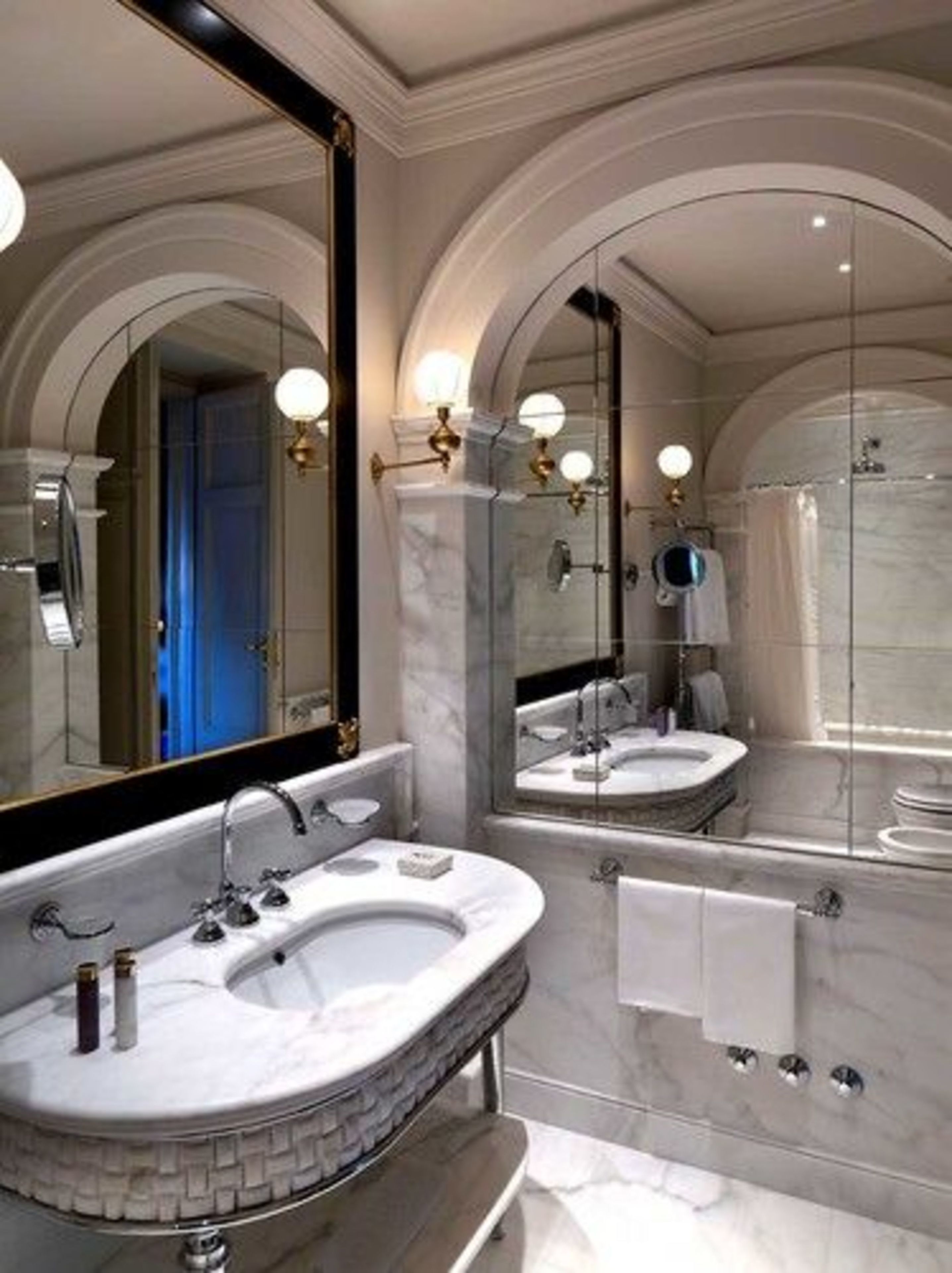 designer toiletries, hair dryer, bathrobes, slippers