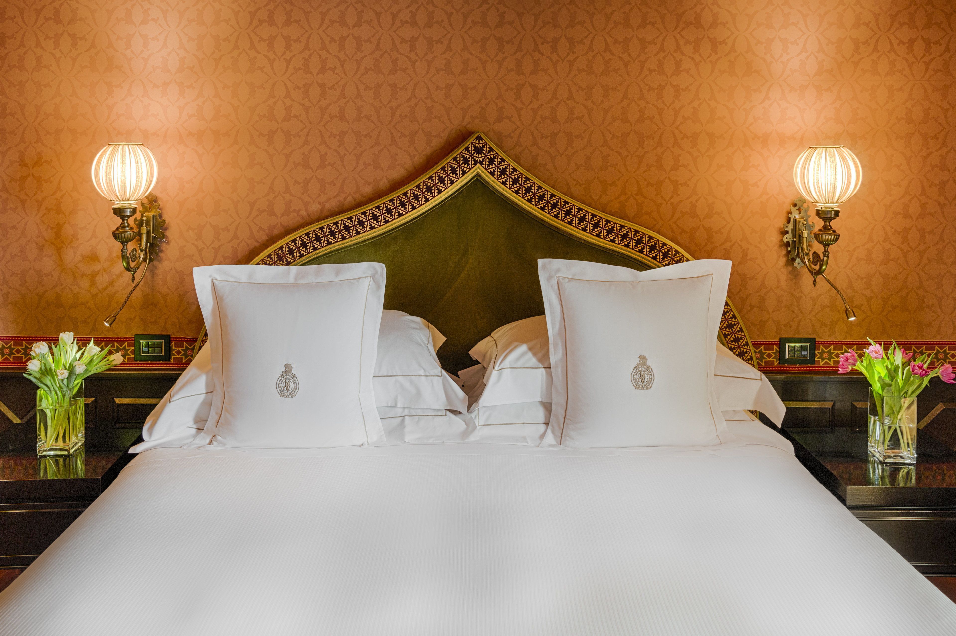 Premium bedding, down comforters, minibar, in-room safe