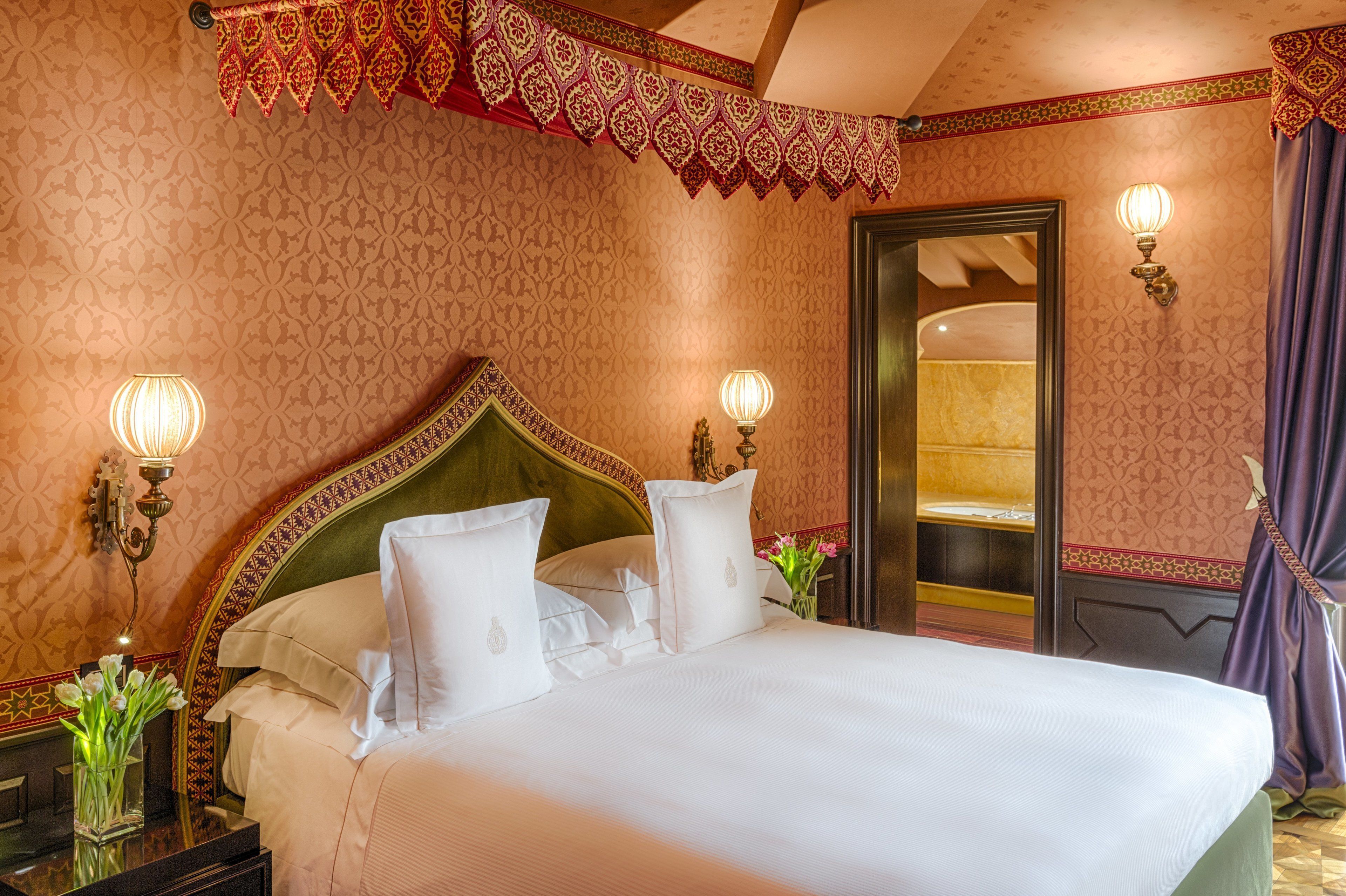 Premium bedding, down comforters, minibar, in-room safe