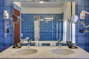 Superior Double Room | Bathroom | Rainfall showerhead, designer toiletries, hair dryer, slippers