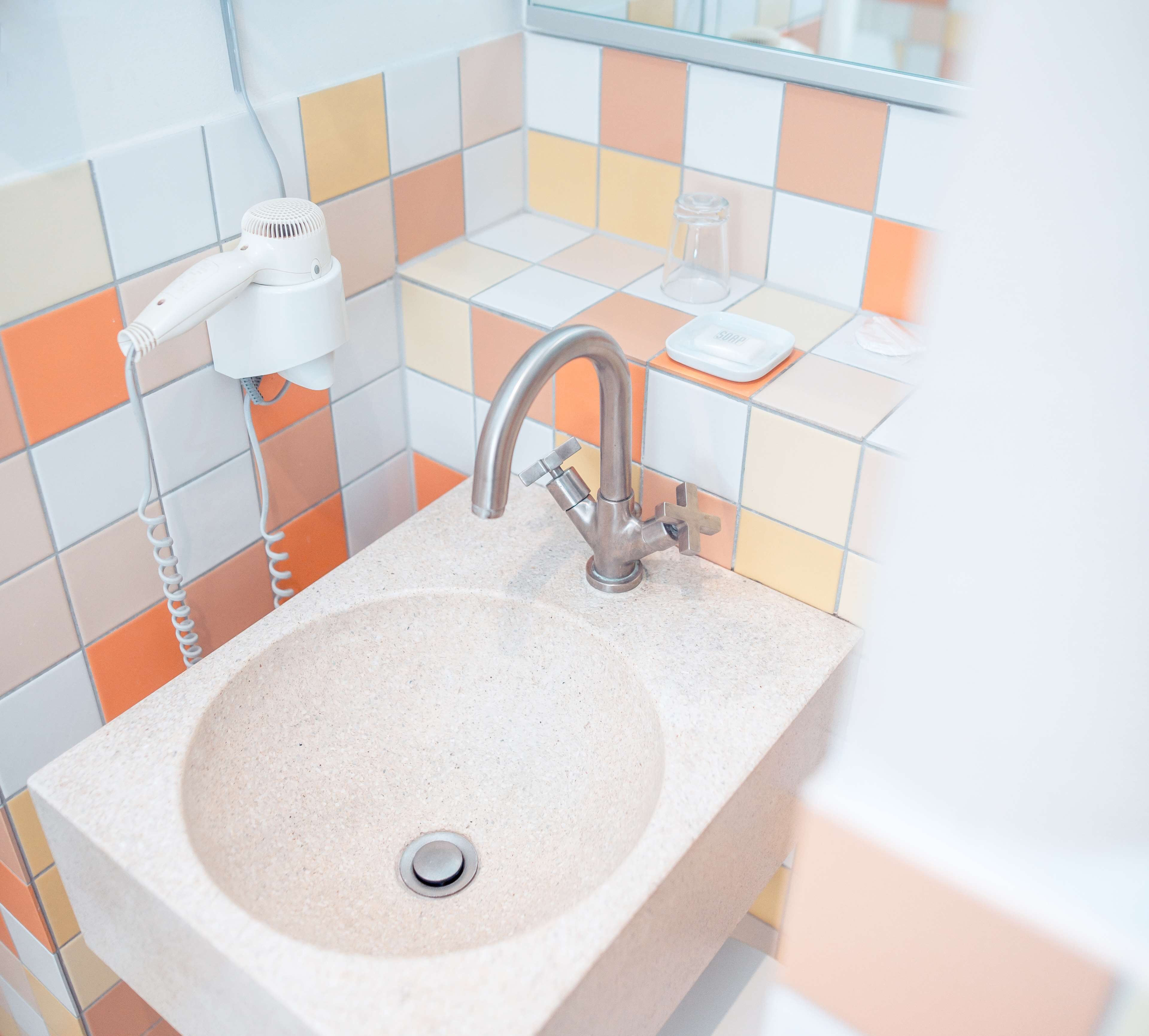 standard room, 1 single bed | bathroom | eco-friendly toiletries, hair dryer, towels