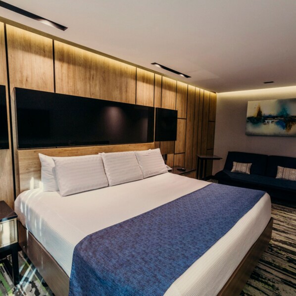 Habitación superior | Ropa de cama de alta calidad, camas con pillow-top y minibar 