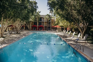2 outdoor pools, open 10:00 AM to 10:00 PM, pool umbrellas