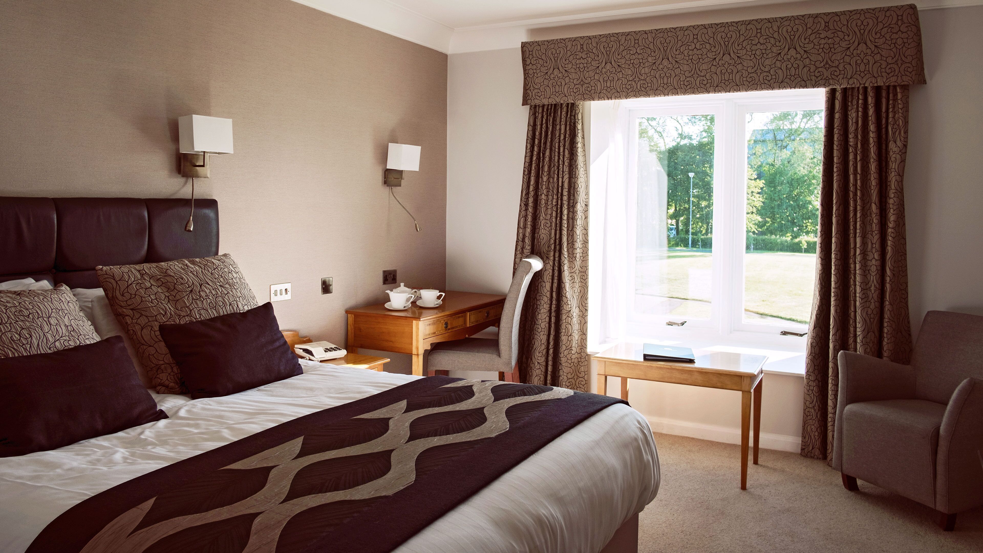 Premium bedding, in-room safe, individually decorated, desk