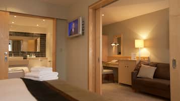 Luxury Studio Suite | Living area | 32-inch LCD TV with digital channels, TV