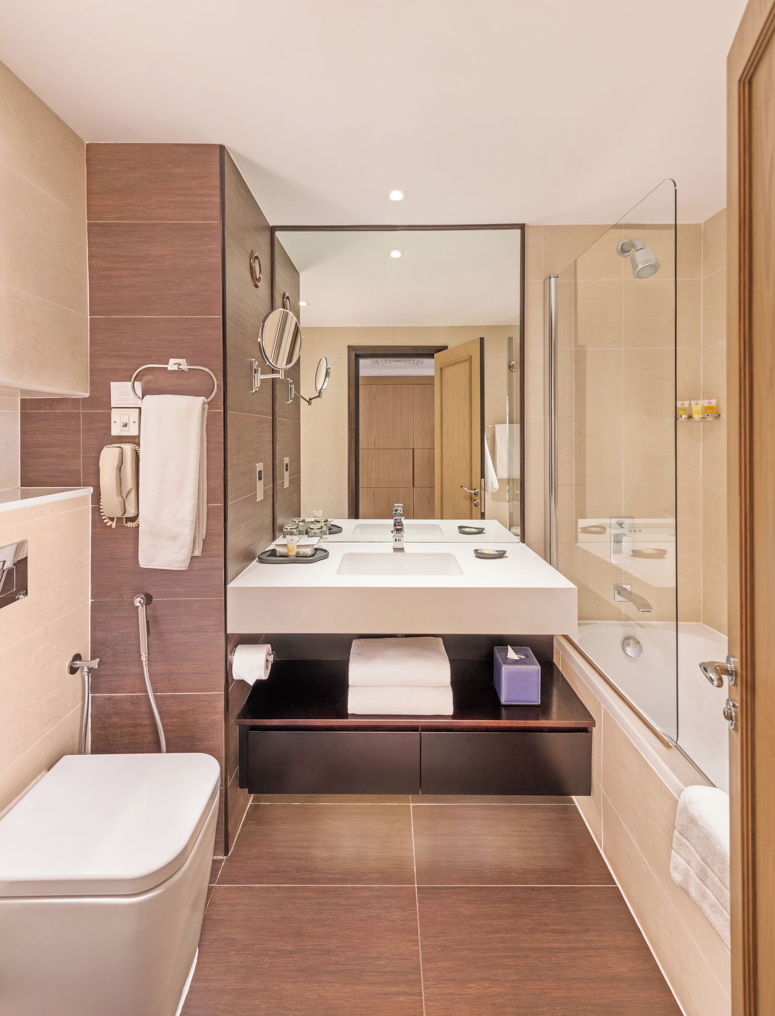 combined shower/bathtub, free toiletries, hair dryer, bathrobes