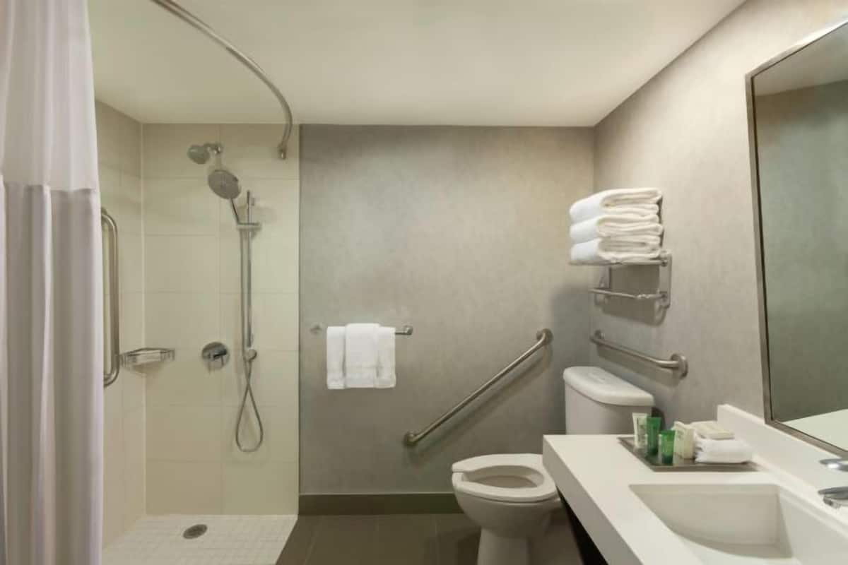 Designer toiletries, hair dryer, towels, soap