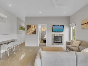 Two Bedroom Villa | Living area | 50-inch flat-screen TV with digital channels, TV, DVD player