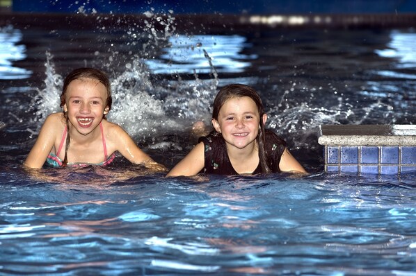 Indoor pool, open 8:00 AM to 8:00 PM, pool loungers
