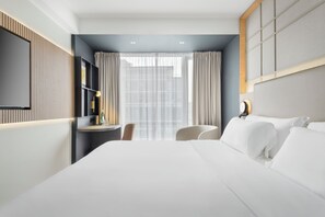 Premium bedding, pillow-top beds, in-room safe, desk