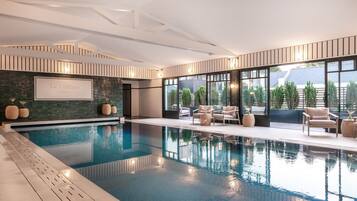 Indoor pool, pool umbrellas, sun loungers