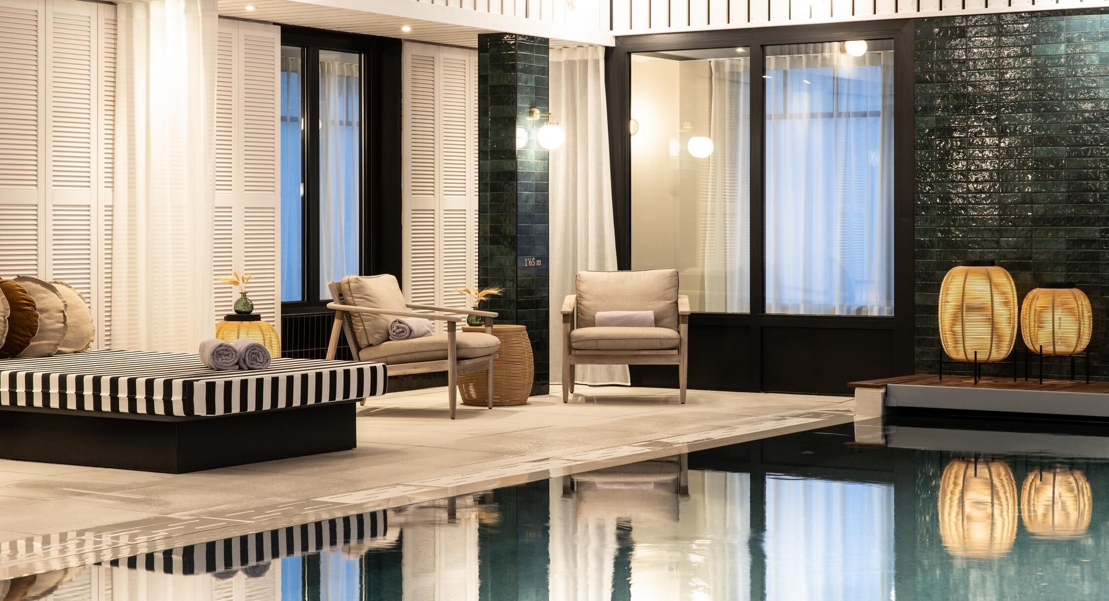 Indoor pool, pool umbrellas, sun loungers