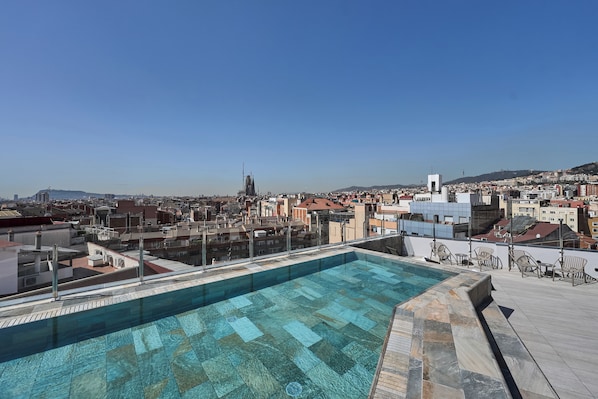 Outdoor pool, pool umbrellas, pool loungers