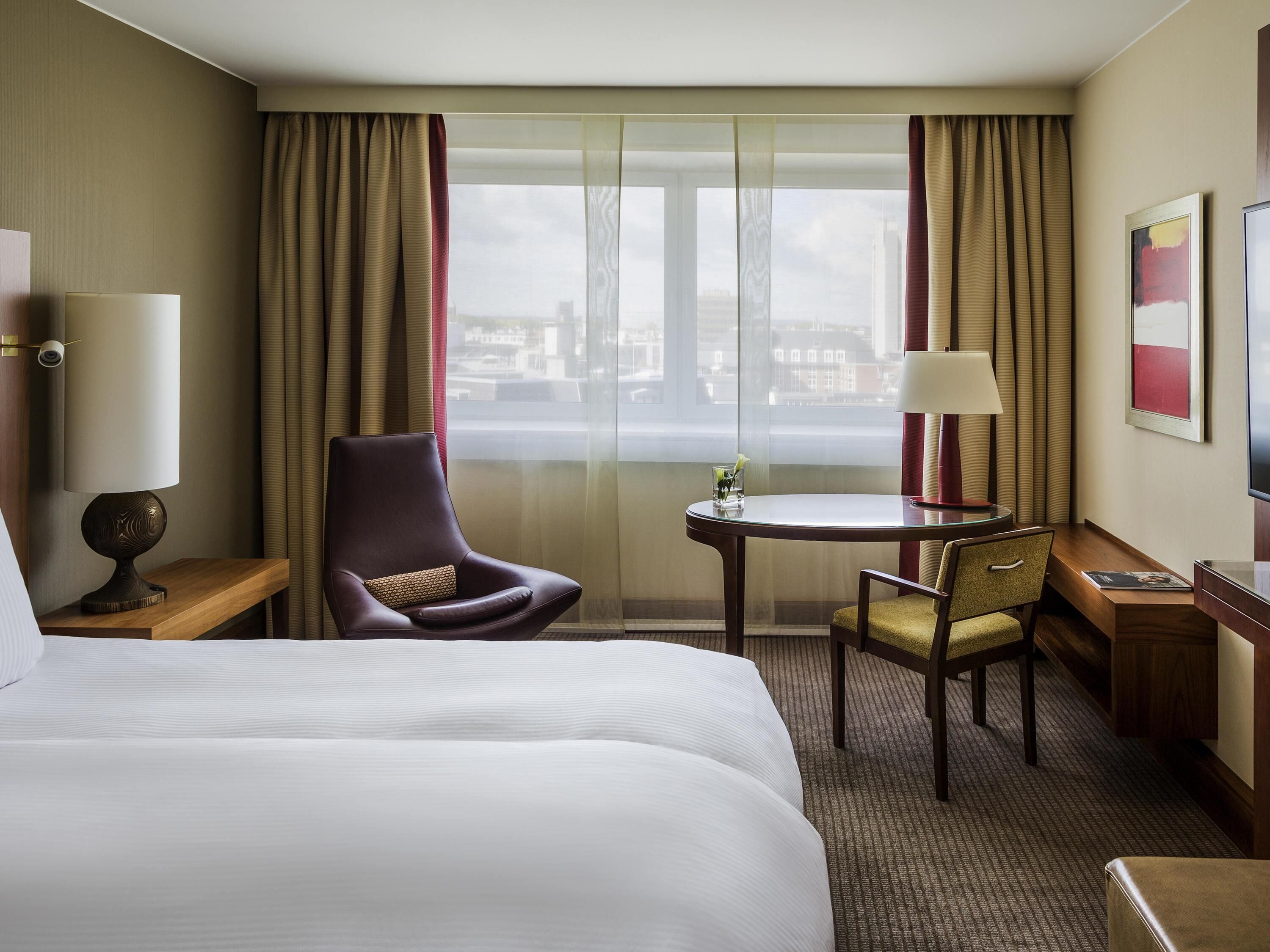Ropa de cama de alta calidad y minibar 