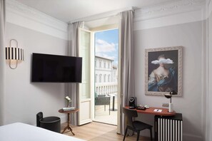 Deluxe Room, 1 King Bed, Terrace | Minibar, in-room safe, individually decorated, desk