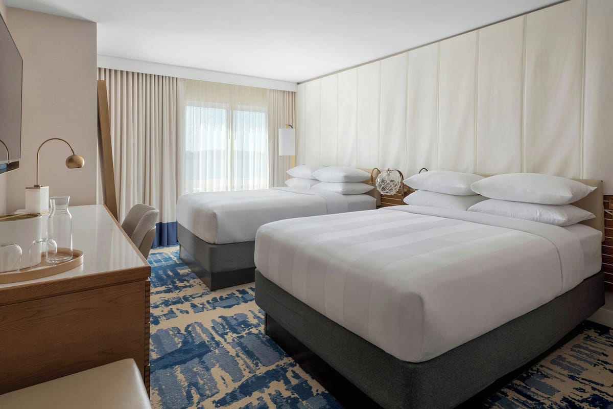 Premium bedding, down comforters, in-room safe, desk