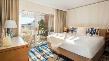 Premium bedding, down duvets, in-room safe, desk