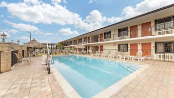 Outdoor pool, a heated pool, open 8:00 AM to 8:30 PM, sun loungers